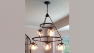 Installing a new chandelier is really a two-person job!