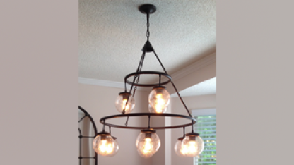 Installing a new chandelier is really a two-person job!