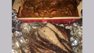 Smoked beef brisket with smoked baked beans and roasted potatoes